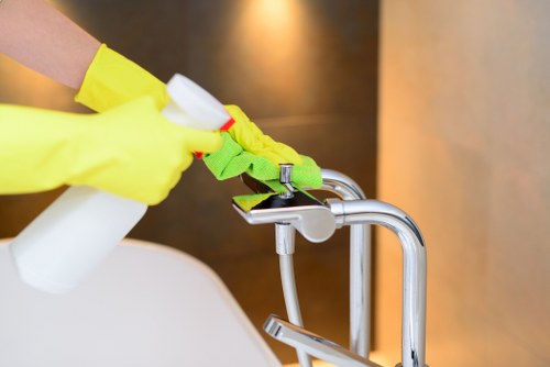 Builder residue and dust being cleaned from a bright interior space