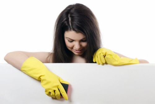 Vacuuming a mattress during routine mattress cleaning