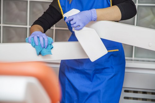 At-home sofa cleaning with vacuum and cloth